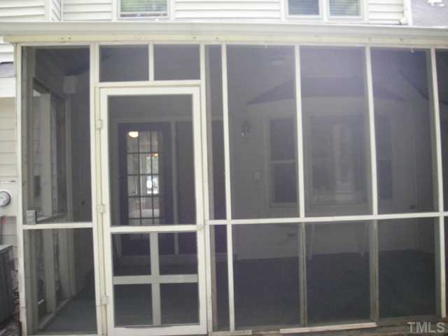134 Towne View Trail Garner, NC 27529 - Photo 15 of 16 Well proportioned screen porch with storage room on the back as well.