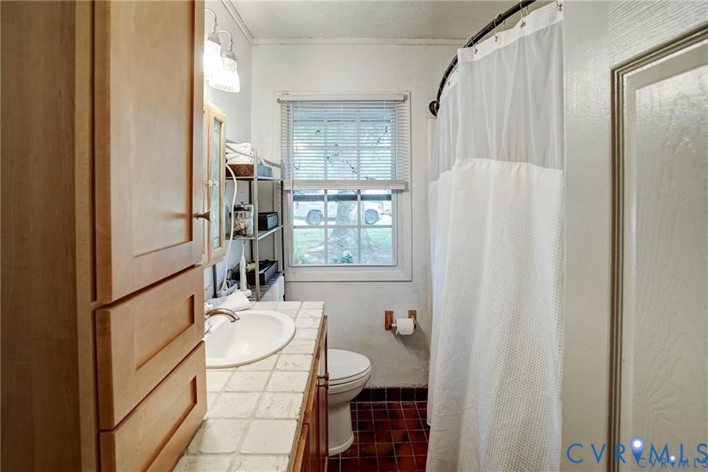 14357 Western Riders Lane Glen Allen, VA 23059 - Photo 12 of 21 a bathroom with a sink toilet and shower