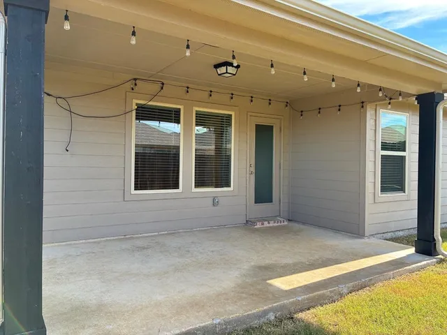 a view of a backyard with a garden