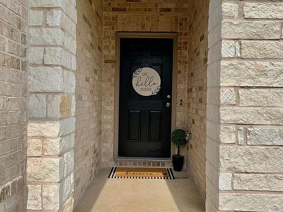 a view of a entryway of a house