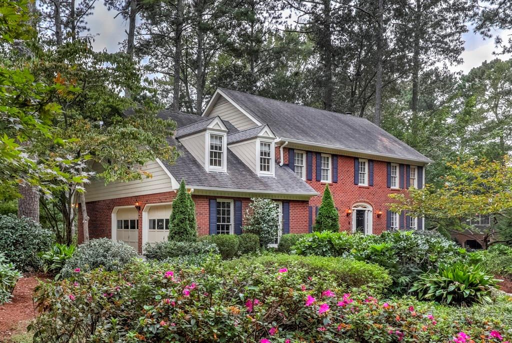 861 Colston Road Marietta, GA 30064 - Photo 1 of 1 a front view of a house with yard and green space