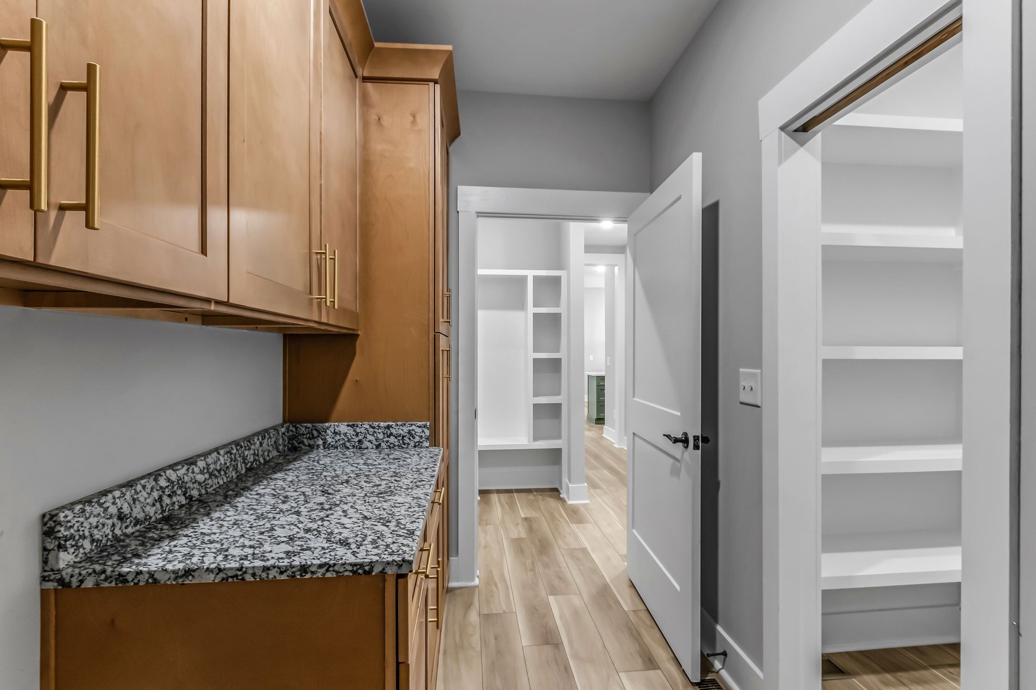 4106 Asbury Road Manchester, TN 37355 - Photo 28 of 58 a kitchen with a refrigerator and cabinets