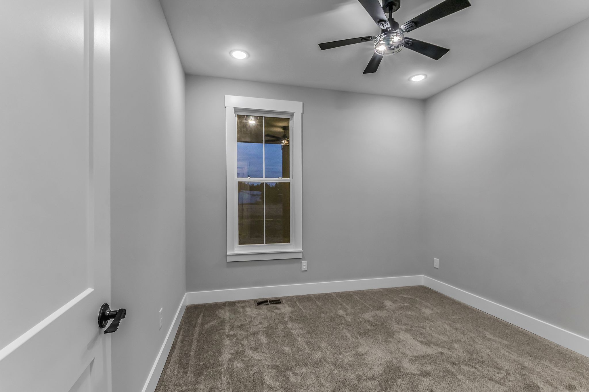 4106 Asbury Road Manchester, TN 37355 - Photo 33 of 58 an empty room with a empty space and windows