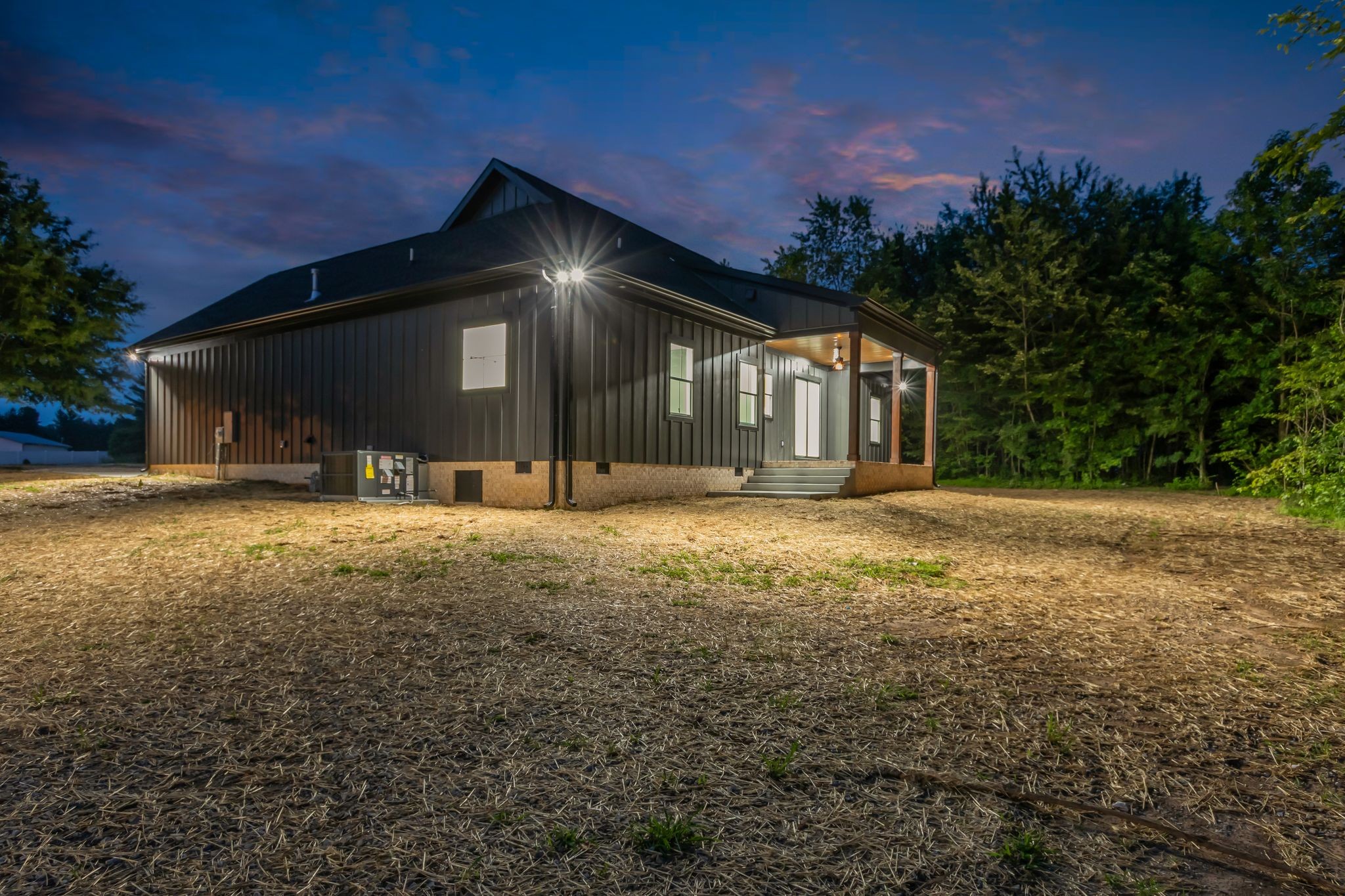 4106 Asbury Road Manchester, TN 37355 - Photo 44 of 58 a front view of a house with a yard