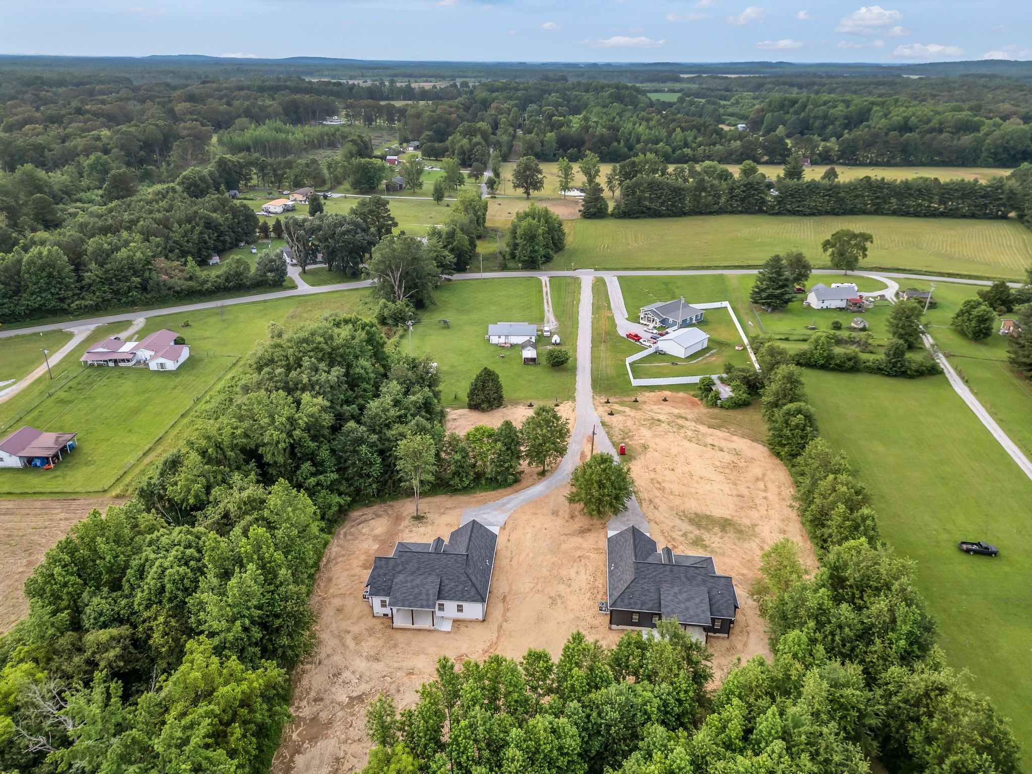 4106 Asbury Road Manchester, TN 37355 - Photo 55 of 58 an aerial view of a house with a lake view