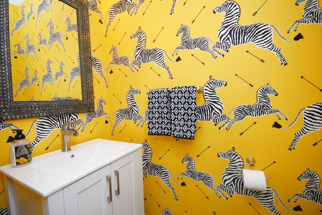 39 Ridgewood Drive, Unit 39 Stow, MA 01775 - Photo 11 of 26 a bathroom with a sink and a mirror