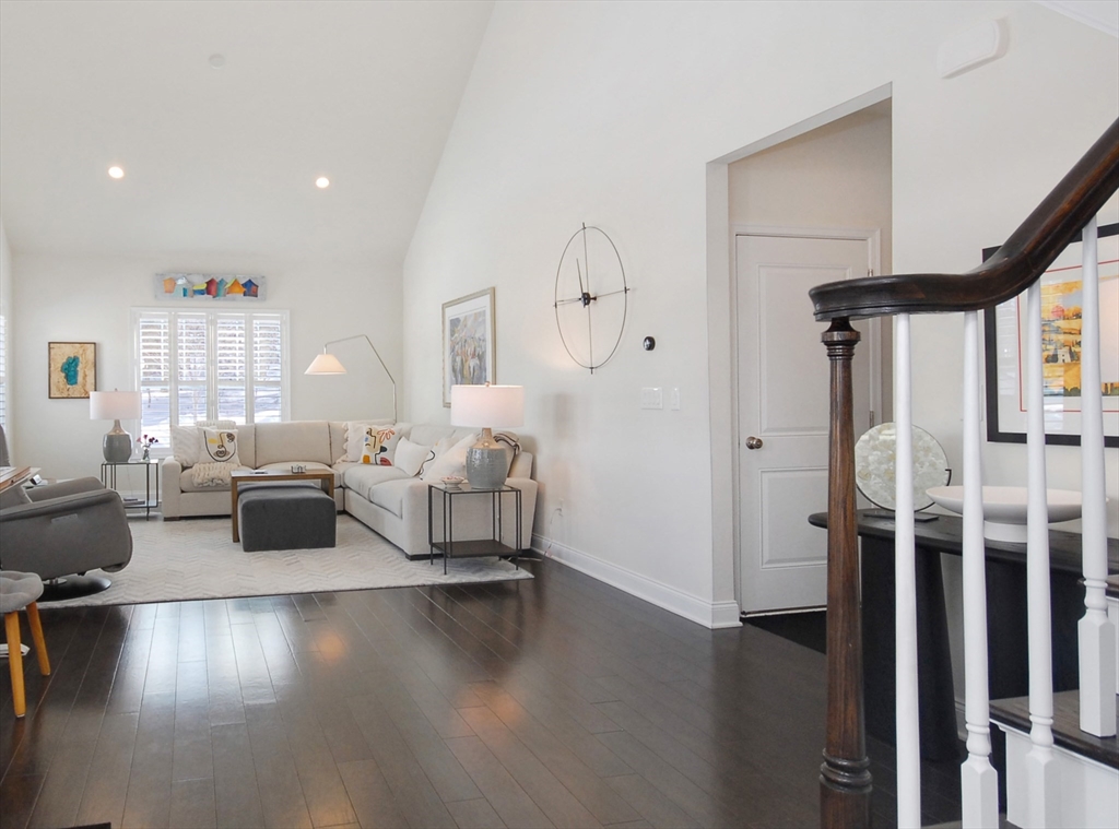 39 Ridgewood Drive, Unit 39 Stow, MA 01775 - Photo 2 of 26 a living room with furniture window and wooden floor