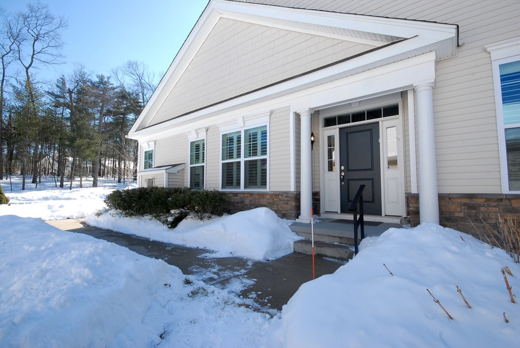 39 Ridgewood Drive, Unit 39 Stow, MA 01775 - Photo 21 of 26 a view of backyard of the house