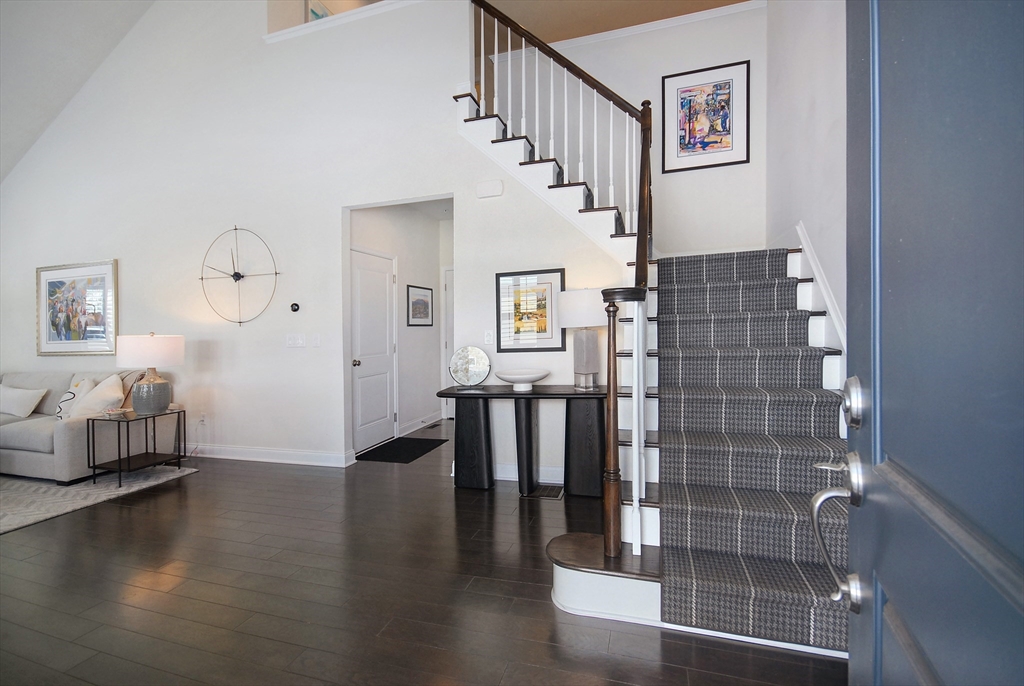 39 Ridgewood Drive, Unit 39 Stow, MA 01775 - Photo 3 of 26 a view of livingroom with furniture and wooden floor