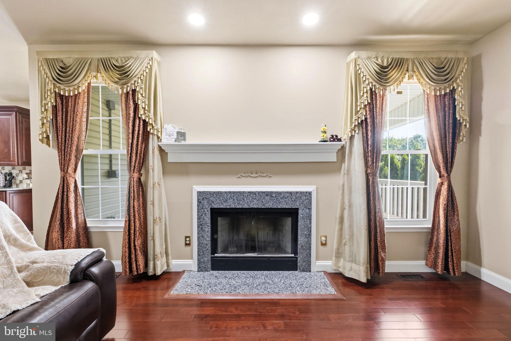 17 Paddock Road Marlton, NJ 08053 - Photo 9 of 54 Elegant fireplace with stylish drapes.