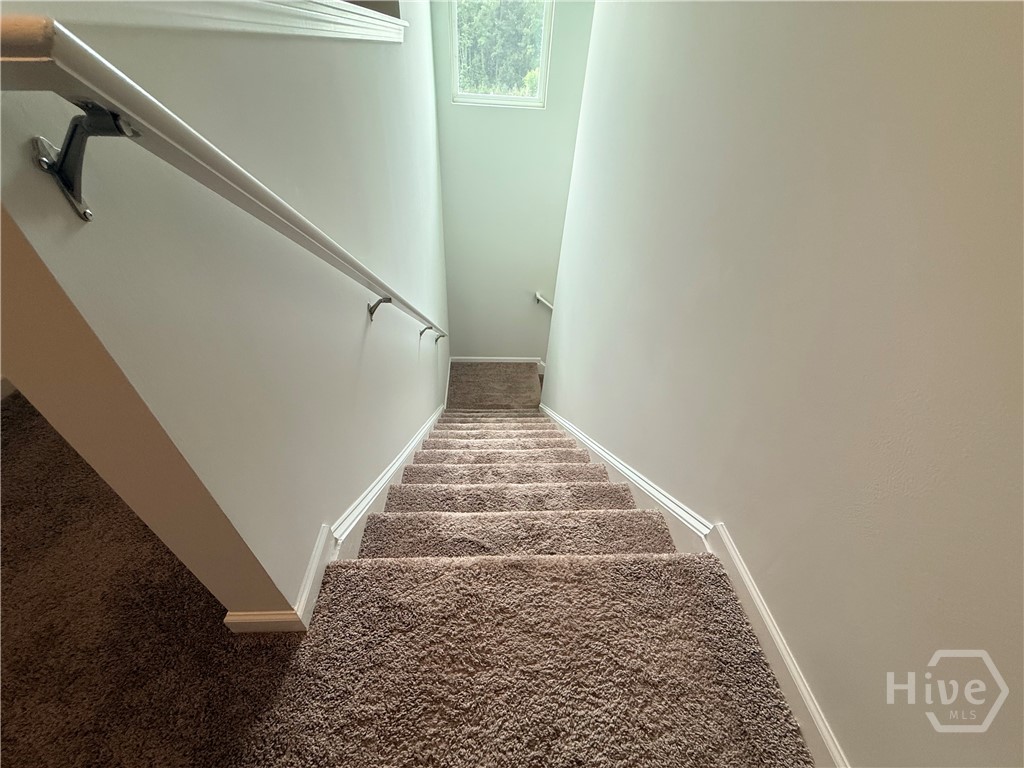 1244 Wilkins Road Midway, GA 31320 - Photo 29 of 58 Stairwell Leading down to floor 1