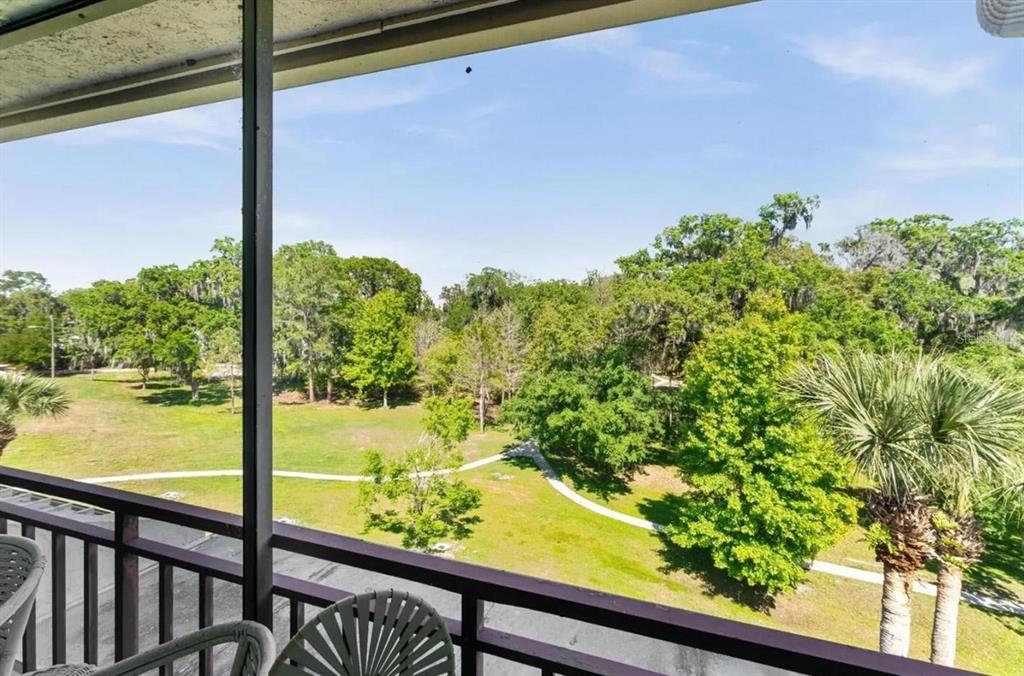 1162 Carmel Circle, Unit 440 Casselberry, FL 32707 - Photo 20 of 30 a view of lake from a window