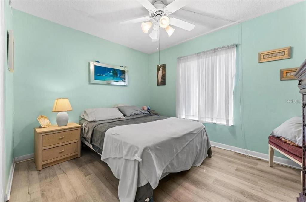 1162 Carmel Circle, Unit 440 Casselberry, FL 32707 - Photo 2 of 30 a bedroom with bed and window
