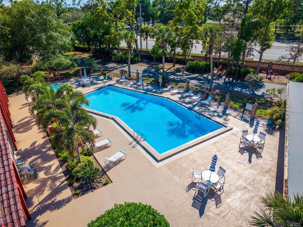 1162 Carmel Circle, Unit 440 Casselberry, FL 32707 - Photo 25 of 30 an aerial view of a swimming pool with outdoor seating