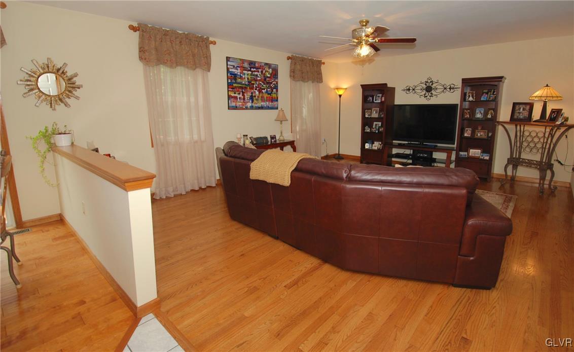 625 Turkey Ridge Road Mount Bethel, PA 18343 - Photo 15 of 43 a living room with furniture and a flat screen tv