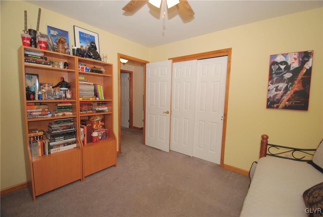 625 Turkey Ridge Road Mount Bethel, PA 18343 - Photo 27 of 43 a view of a livingroom with shelves