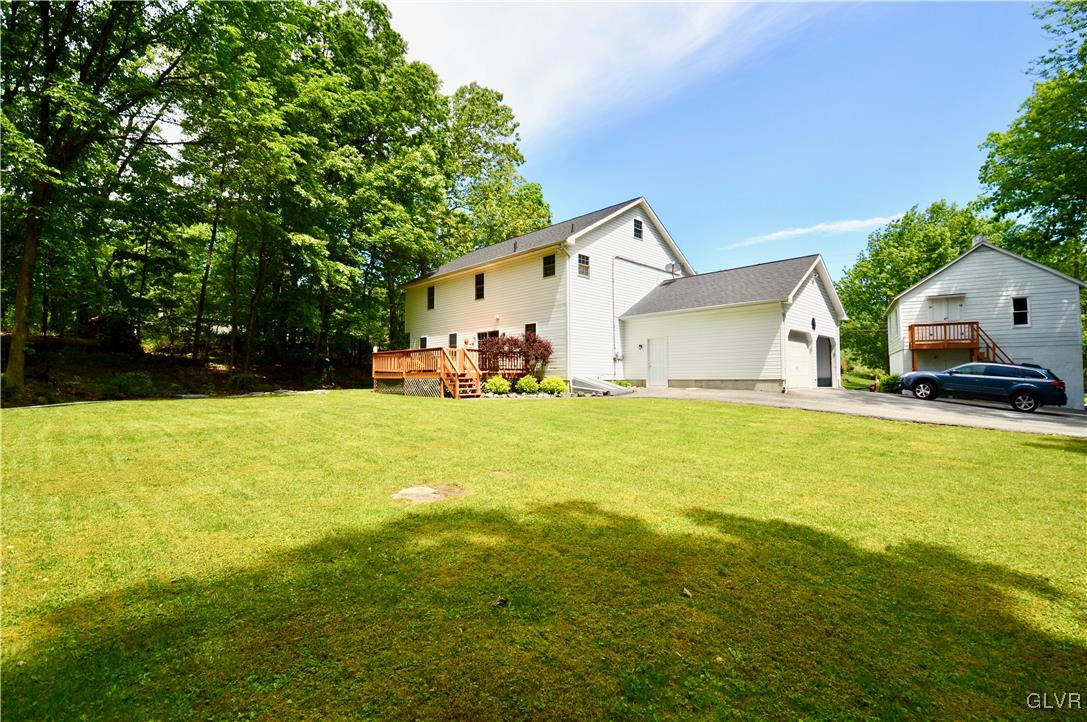 625 Turkey Ridge Road Mount Bethel, PA 18343 - Photo 33 of 43 a house view with swimming pool in front of it