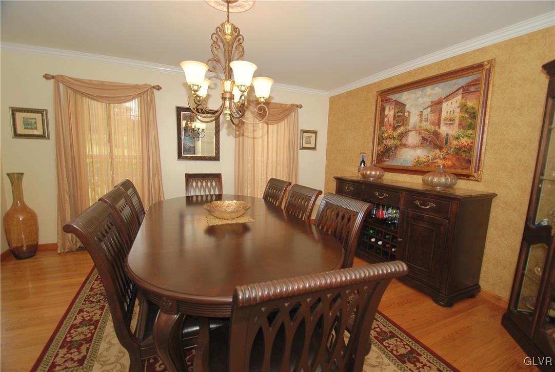 625 Turkey Ridge Road Mount Bethel, PA 18343 - Photo 9 of 43 a view of a dining room with furniture and wooden floor