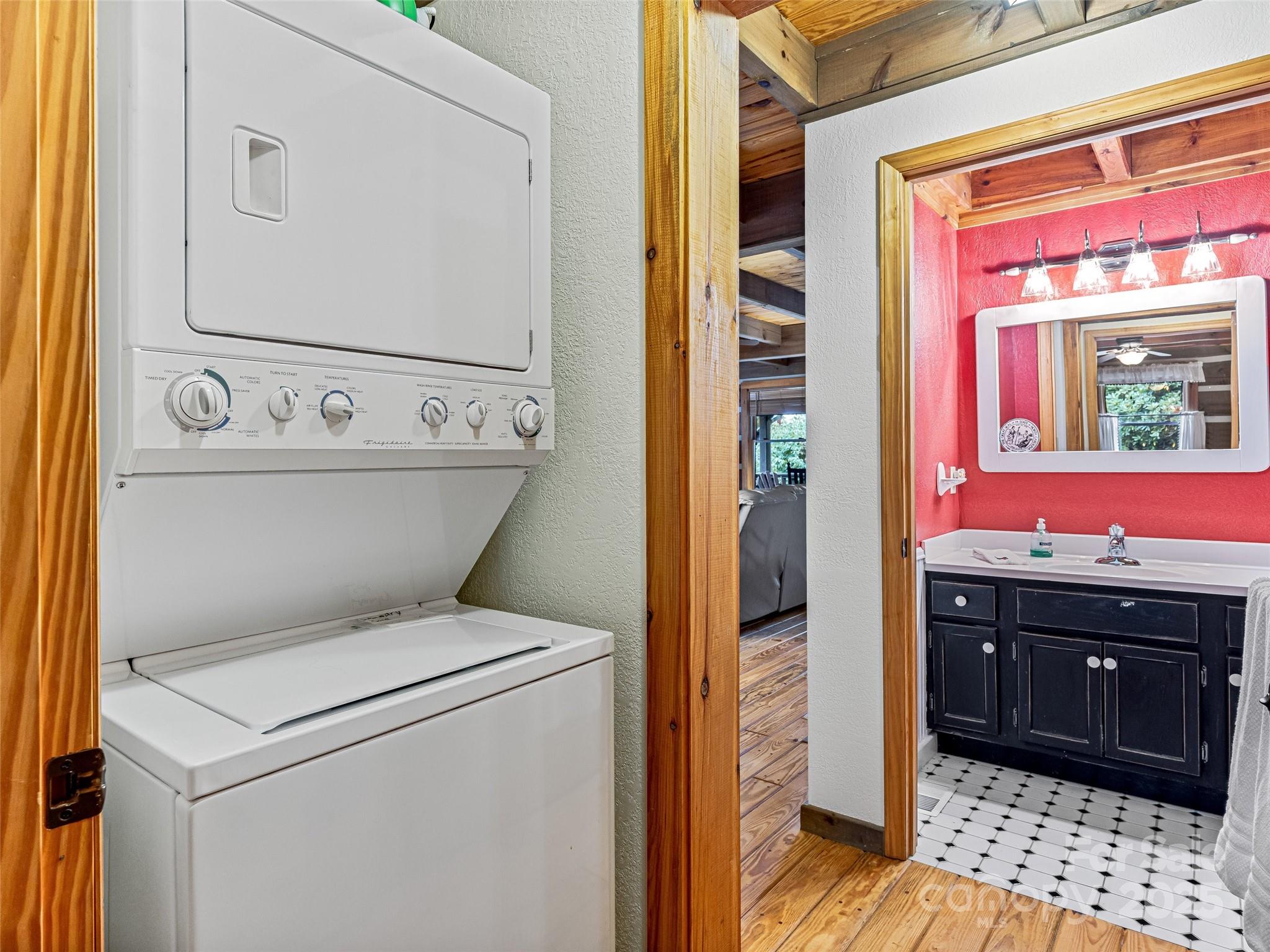 2725 Upper Brush Creek Road Marshall, NC 28753 - Photo 44 of 48 a view of bathroom with a sink and a mirror