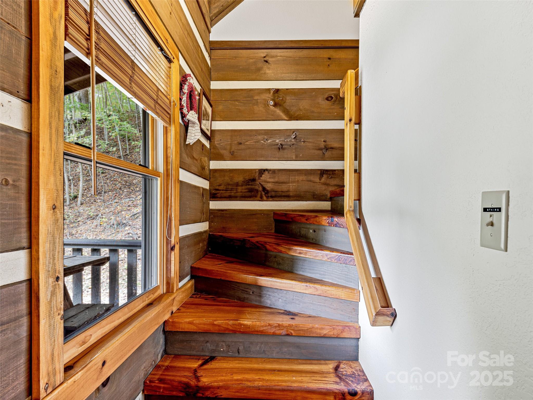 2725 Upper Brush Creek Road Marshall, NC 28753 - Photo 45 of 48 a view of staircase with white walls and windows