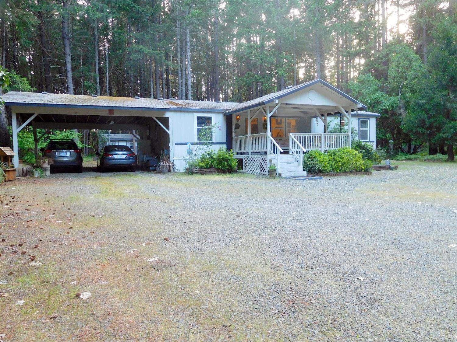 4933 Dick George Road Cave Junction, OR 97523 - Photo 2 of 22 Distant view that allows lots of turn-a-