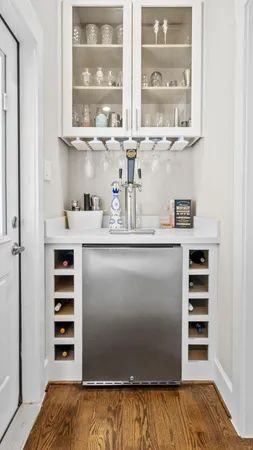 a living room with fireplace furniture and a fireplace