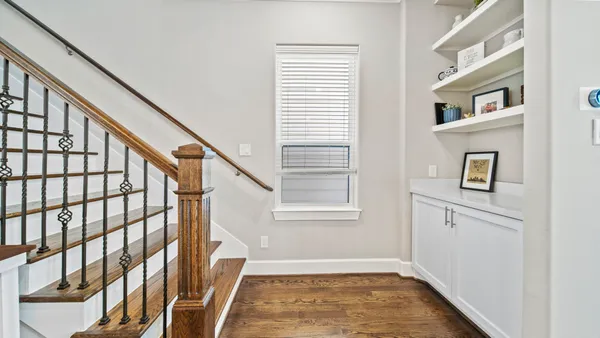 a view of cabinets and window