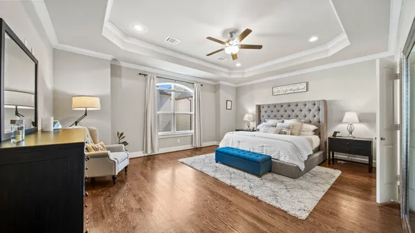 a view of an entryway with wooden floor and stairs