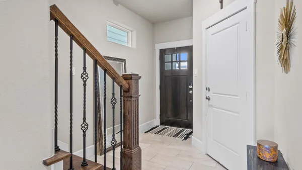 a view of a brick house with windows