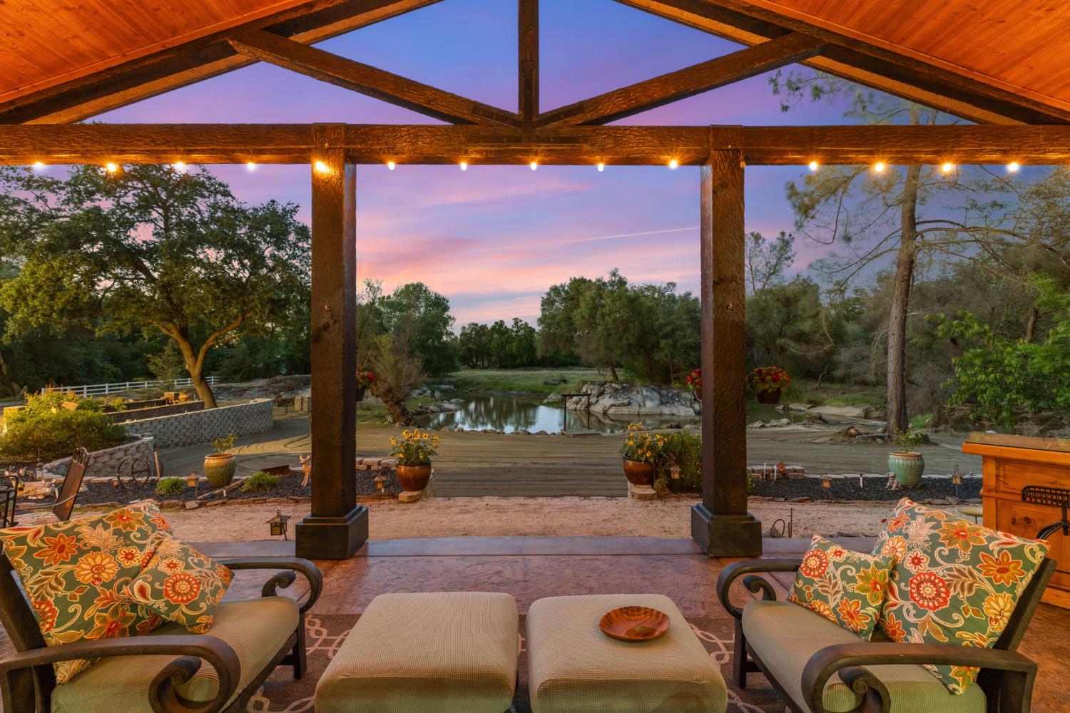 7021 Horseshoe Bar Road Loomis, CA 95650 - Photo 3 of 77 a view of swimming pool with a table and chairs under an umbrella