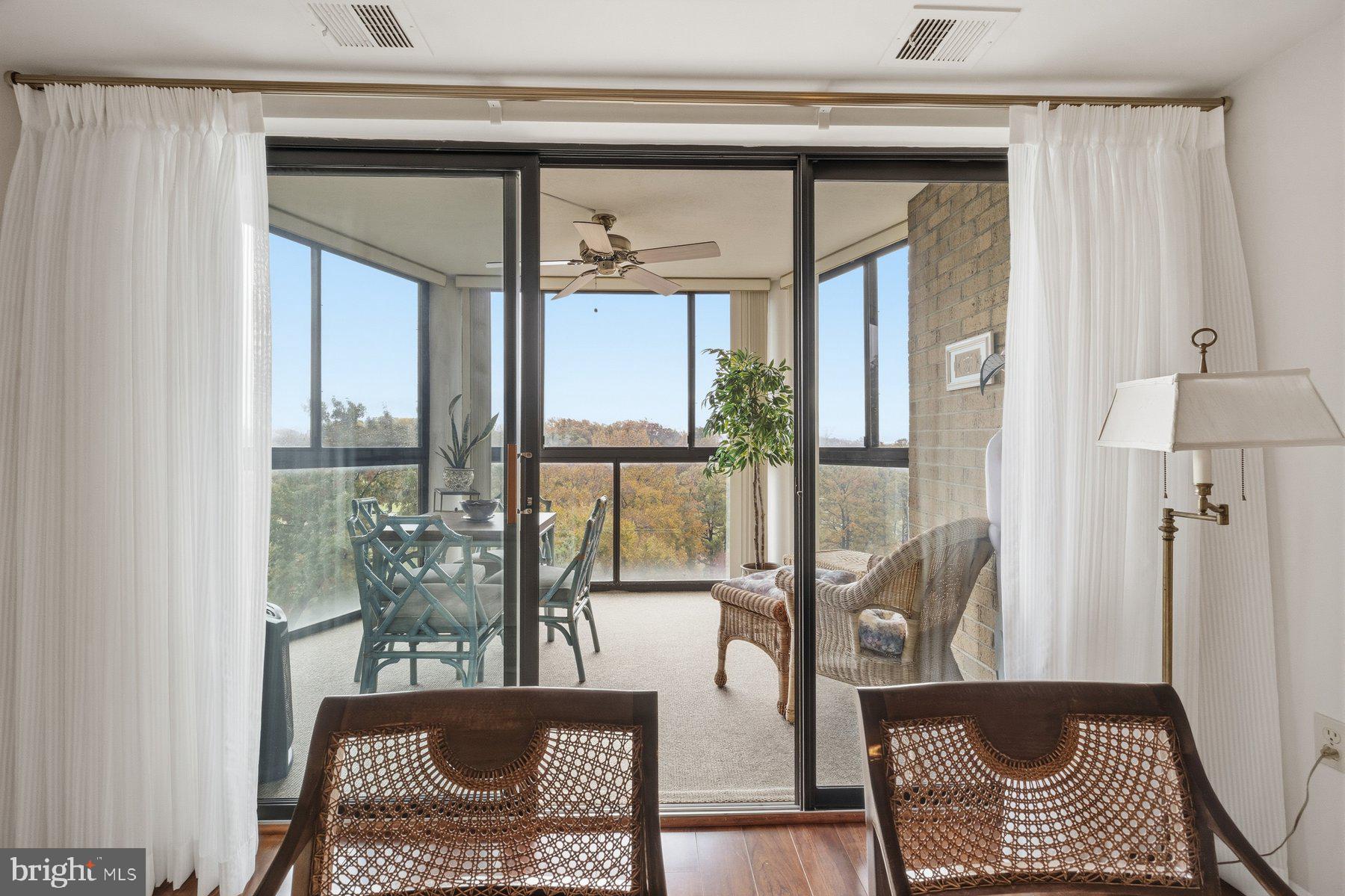 15107 Interlachen Drive, Unit 2822 Silver Spring, MD 20906 - Photo 22 of 35 a living room with furniture