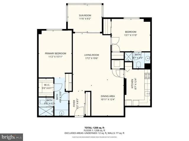 a living room with stainless steel appliances kitchen island granite countertop furniture wooden floor and a view of kitchen