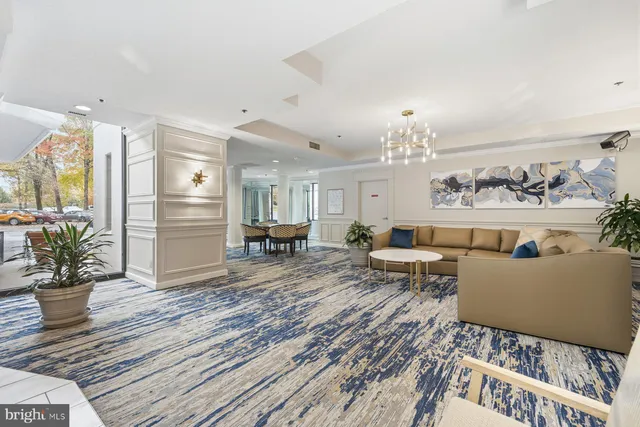 a view of a house with cars park and front view of a house