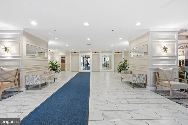 a view of swimming pool with outdoor space and seating area