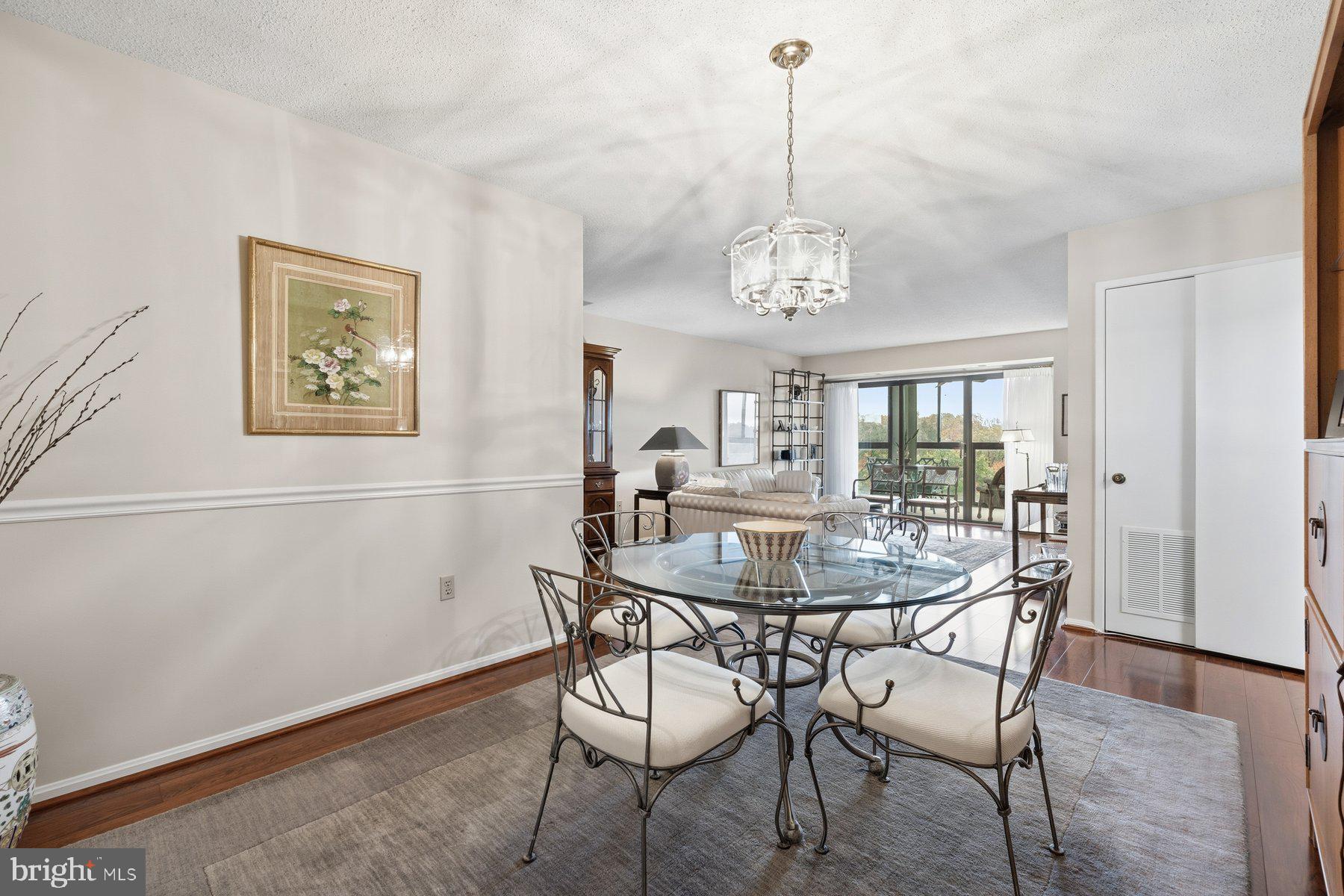 15107 Interlachen Drive, Unit 2822 Silver Spring, MD 20906 - Photo 9 of 35 a view of a dining room with furniture window and outside view