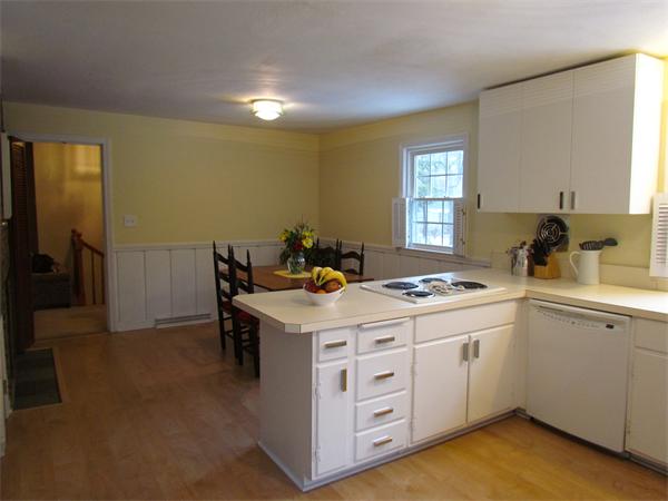 22 White Road Wayland, MA 01778 - Photo 3 of 20 a kitchen that has a sink and a stove