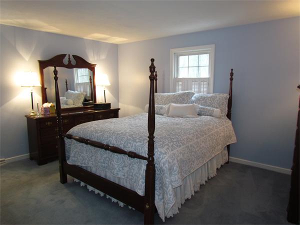 22 White Road Wayland, MA 01778 - Photo 9 of 20 a bedroom with bed and window