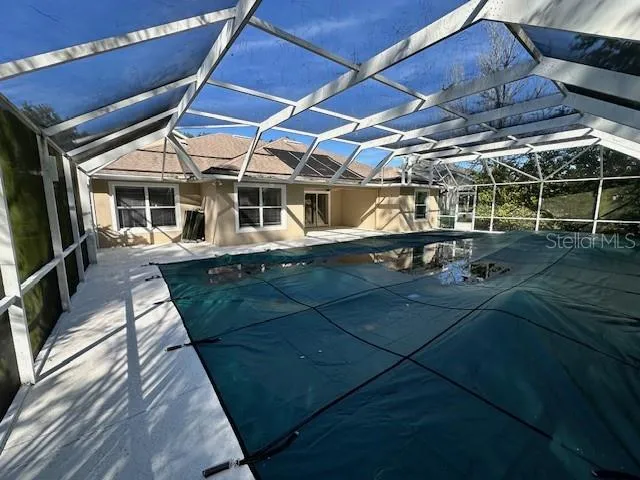 a view of a car park in front of house