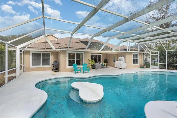 a front view of a house with swimming pool