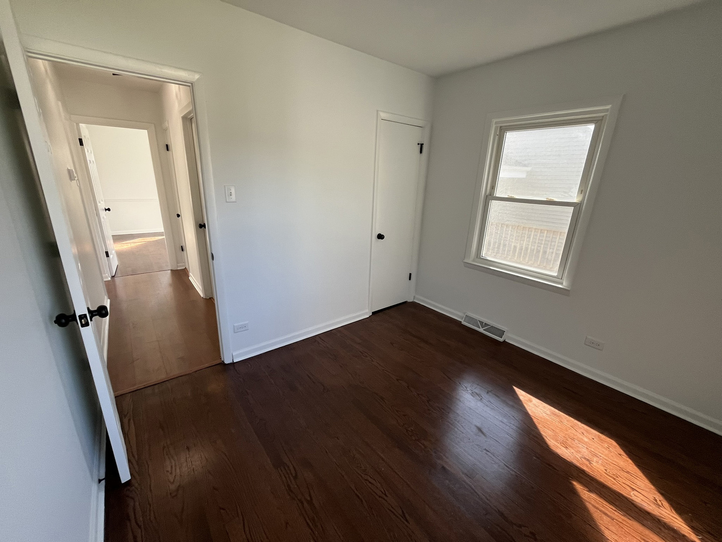 3622 178th Street Lansing, IL 60438 - Photo 10 of 15 an empty room with wooden floor and windows
