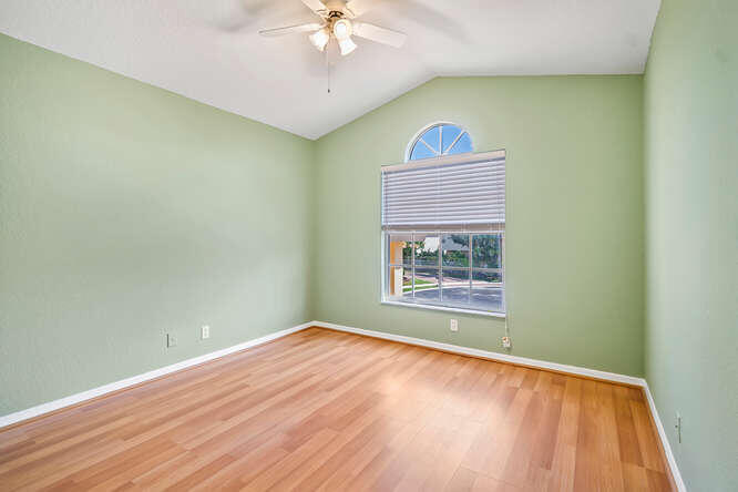 20933 La Plata Court Boca Raton, FL 33428 - Photo 30 of 60 an empty room with a window