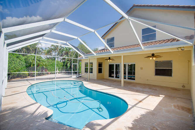 20933 La Plata Court Boca Raton, FL 33428 - Photo 38 of 60 a view of a house with a swimming pool