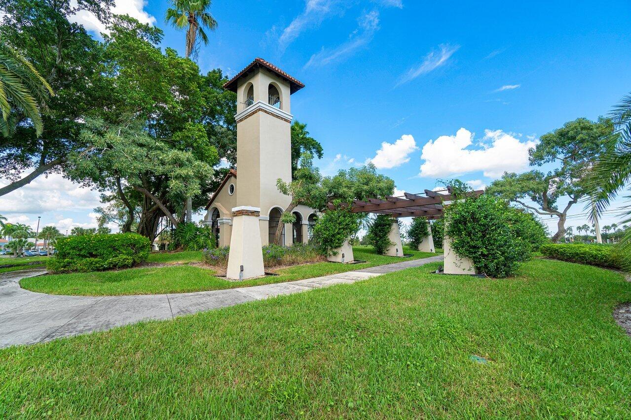 20933 La Plata Court Boca Raton, FL 33428 - Photo 44 of 60 a front view of a house with garden