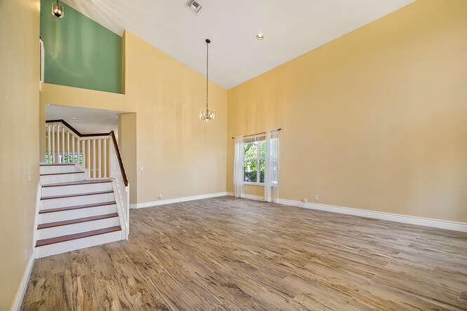 20933 La Plata Court Boca Raton, FL 33428 - Photo 5 of 60 a view of an entryway with wooden floor