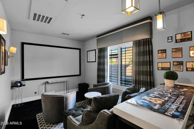 a bedroom with a bed dresser and a window