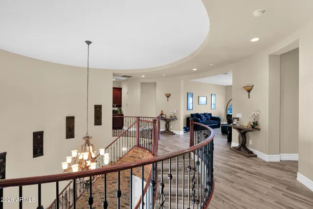 a bedroom with a bed gym equipment and a window