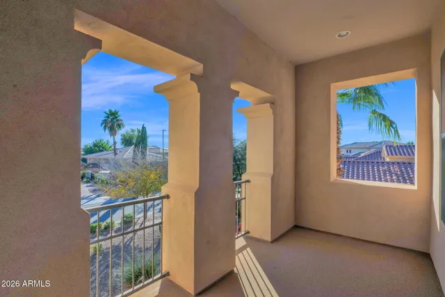 a view of a swimming pool with an outdoor space and seating area