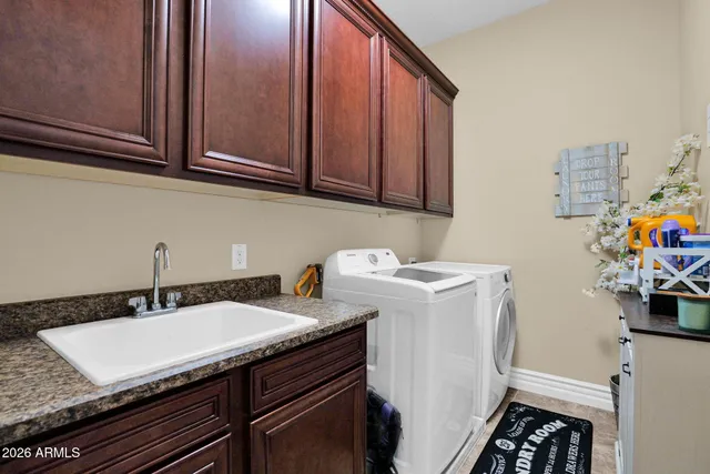 a view of a patio with couches and potted plants