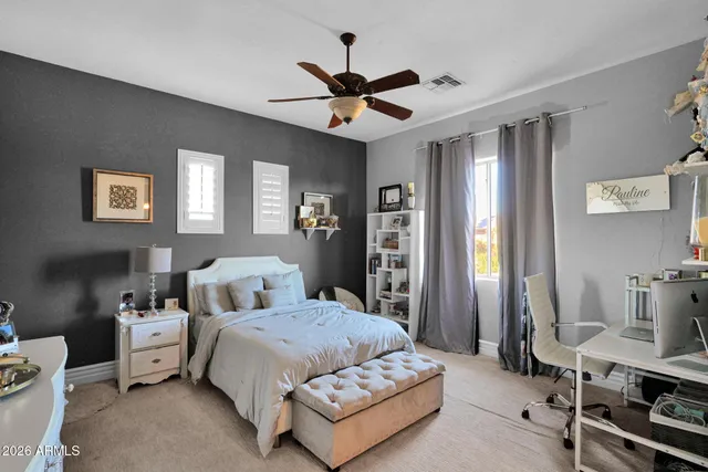 an aerial view of a house with a ocean view