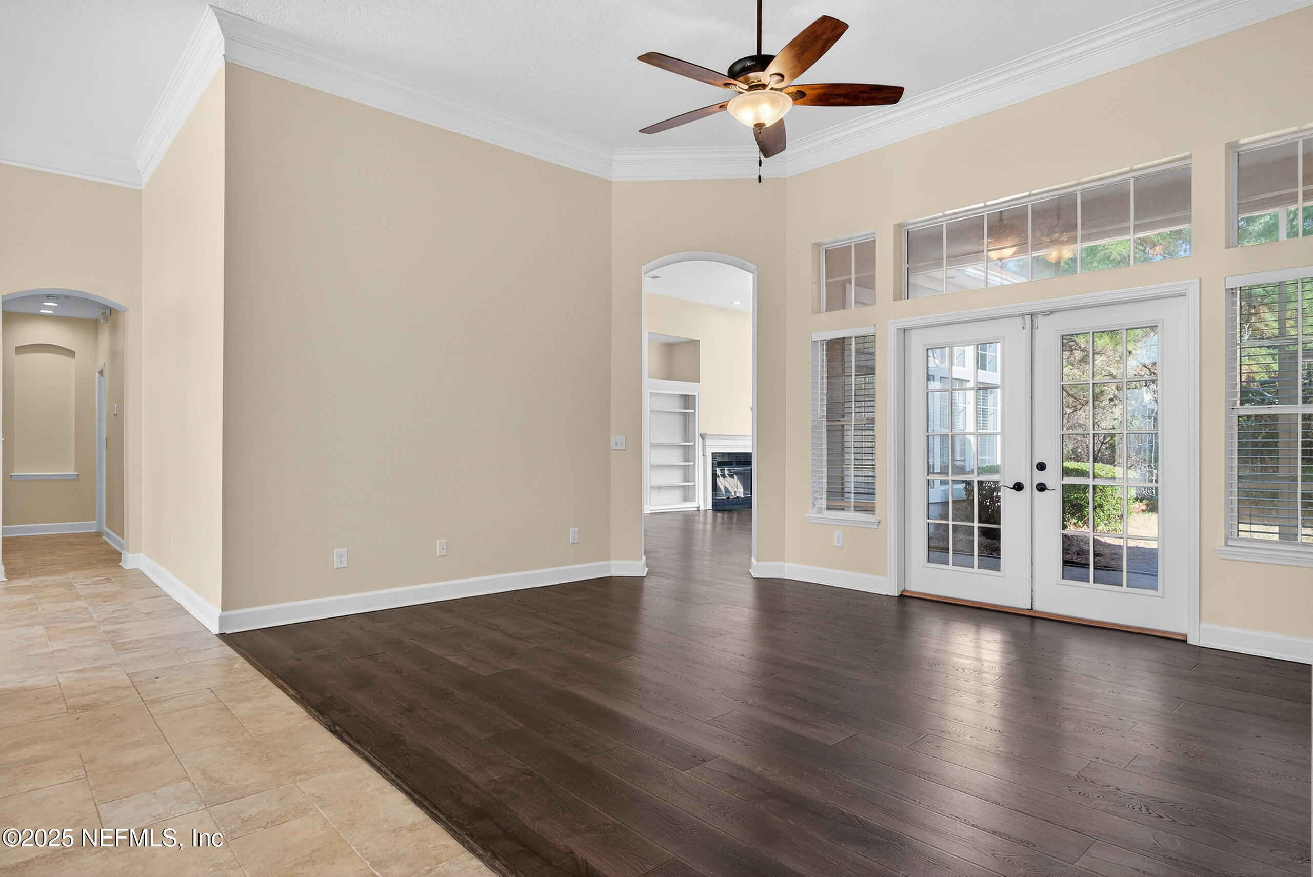577 Hunters Grove Court Orange Park, FL 32073 - Photo 13 of 40 wooden floor in an empty room with a window